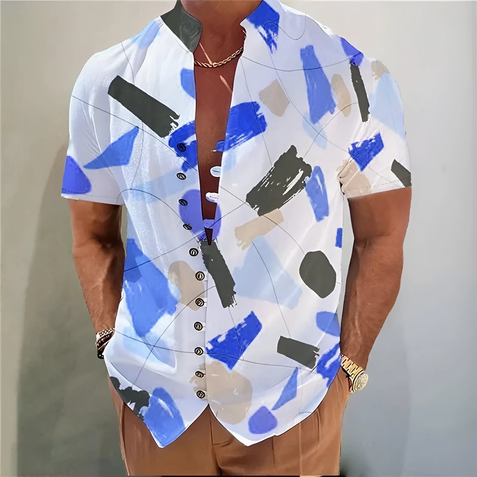 Youth wearing a short sleeve cardigan with a geometric 3D floral print pattern.