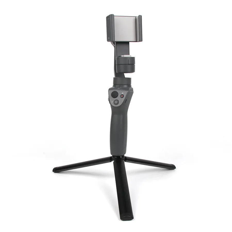 Black aluminium mobile phone tripod and handheld stabiliser accessory compatible with Apple iPhone smartphones