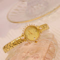 Gold quartz bracelet watch for women with 6mm thickness and embossed vintage detailing