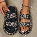 Women's thick-soled EVA slippers in a leopard print design, showing casual style for beach or bathroom use.