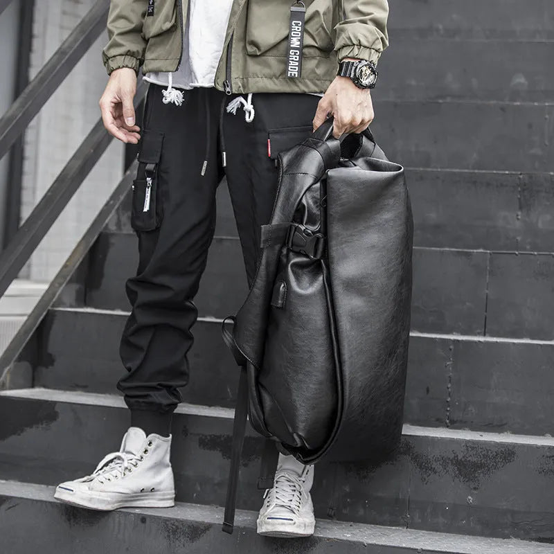 Black PU leather men's shoulder bag with square shape, car suture detail, and double straps