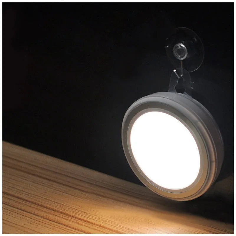 Circular smart LED motion sensor light unit with infrared sensor, 80mm in diameter.