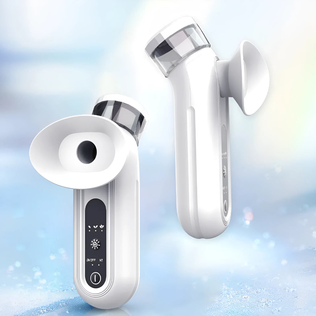 White rechargeable hot and cold compress eye massager device with included eye mask and charging cable on a plain background.