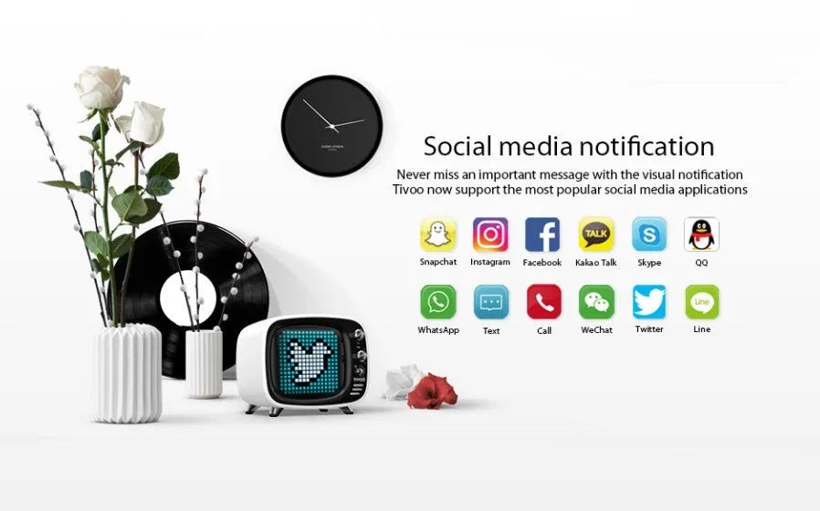 Portable Bluetooth speaker and alarm clock unit in one of six colour options: black, blue, green, pink, red, or white.