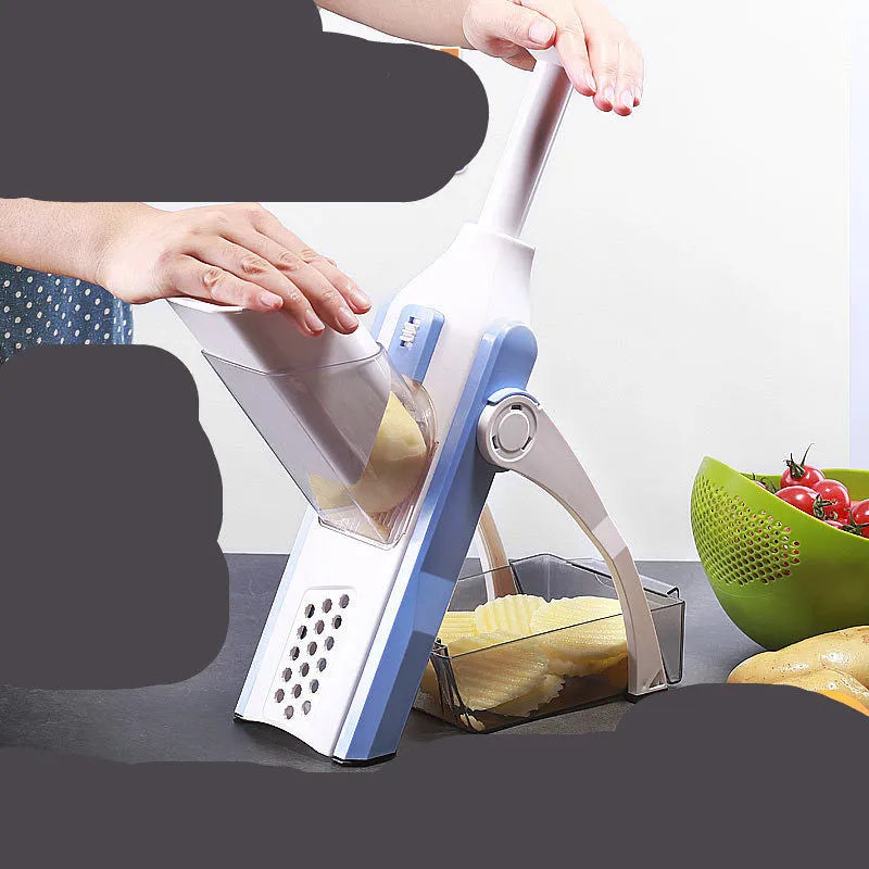 White and blue multifunctional vegetable slicer with stainless steel blades on a kitchen counter