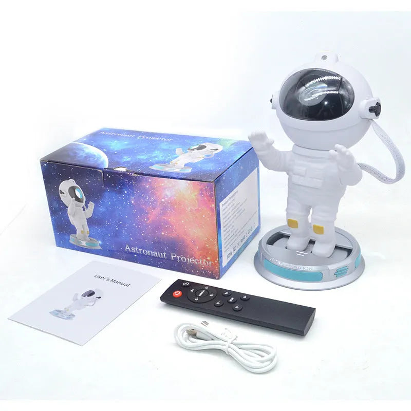 Exit Astronaut Starlight Projection Lamp 22.5cm in white on a surface projecting northern lights onto ceiling
