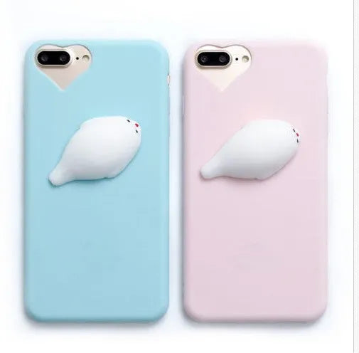 Soft pink TPU silicone iPhone case with a raised 3D cartoon cat design on the back.