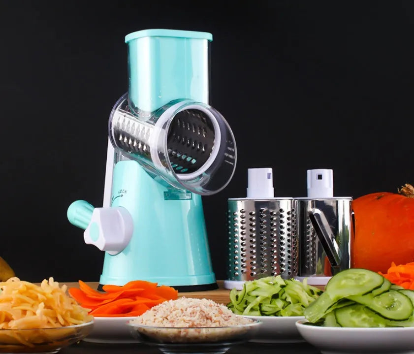 Blue manual mandoline vegetable slicer with stainless steel blade on a kitchen counter.
