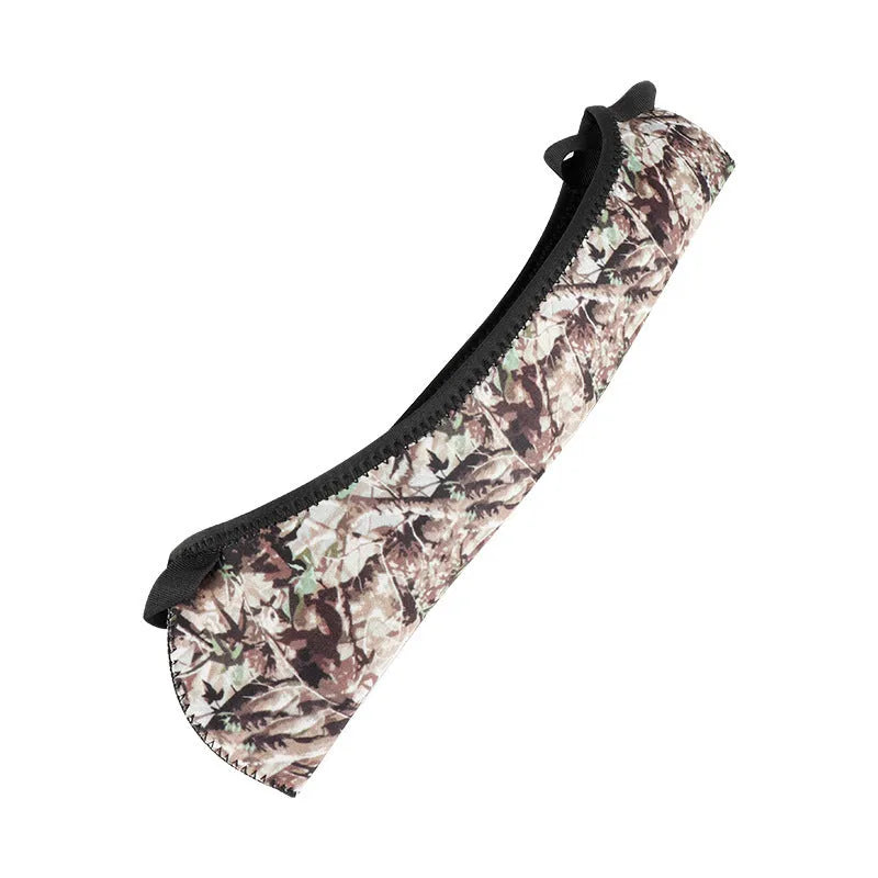 Reversible neoprene scope cover for rifle or shotgun in black and camouflage print lying flat