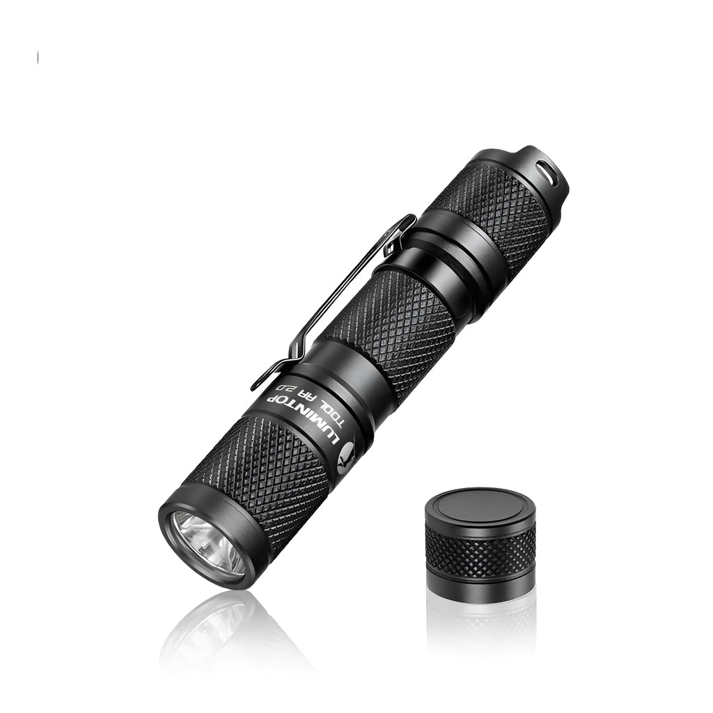 Lumintop Tool AA 2.0 black aluminium torch with keychain, shown next to included 14500 battery and diffuser.