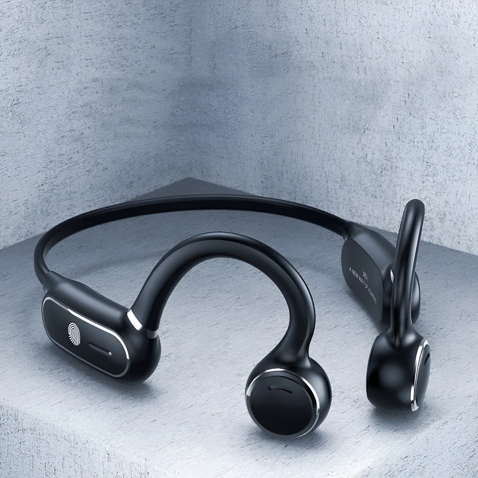 Black air conduction Bluetooth wireless earphones with a titanium alloy hook for over-ear wear.