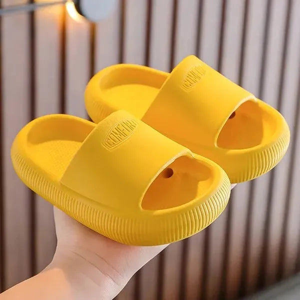 Children's mixed colour EVA slippers with a non-slip sole, shown in sizes for kids.