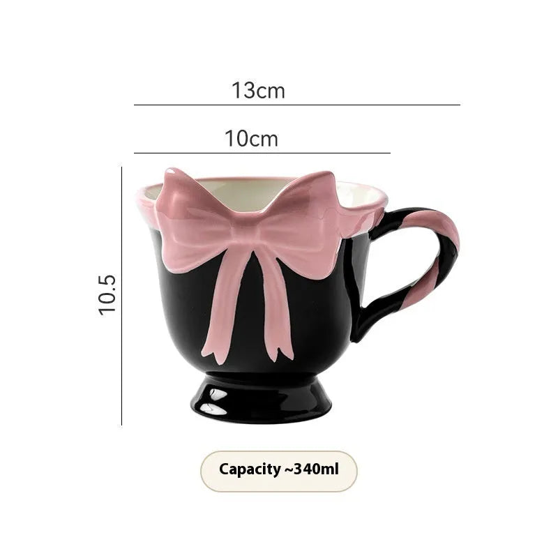 Original heart bow design ceramic mug in black pink or white powder colour, 350ml capacity.
