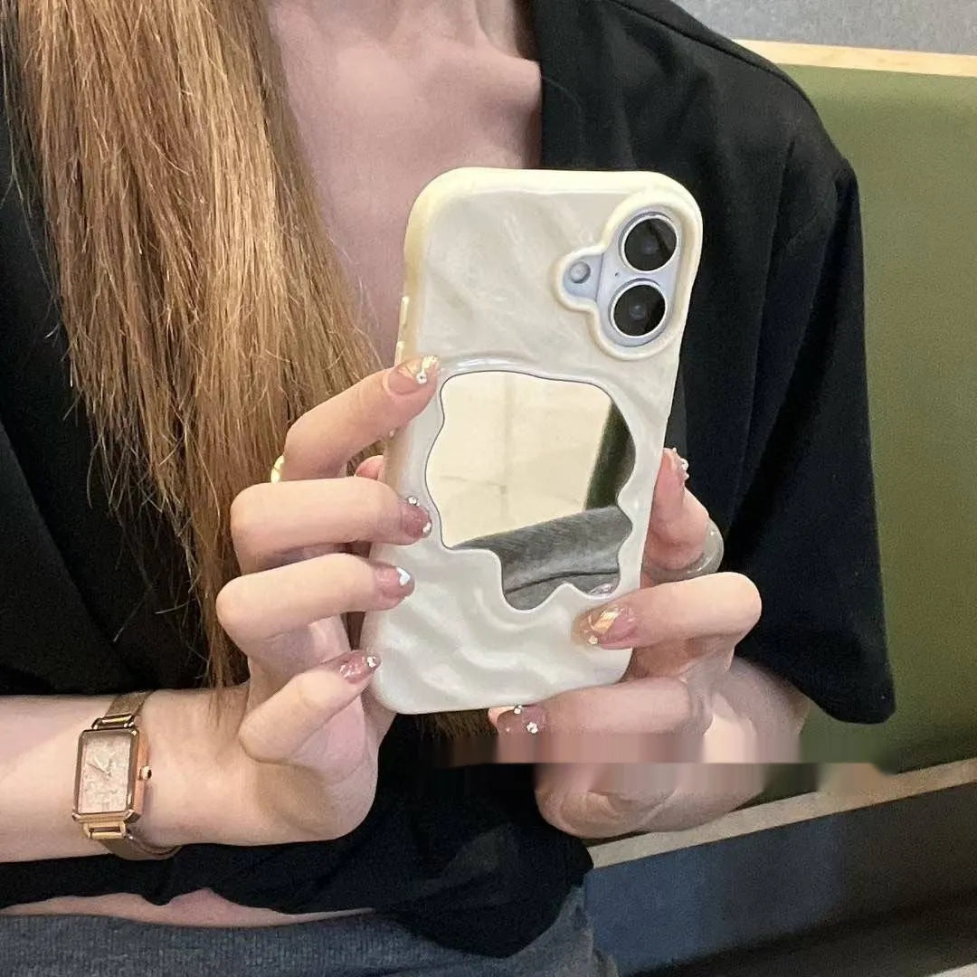 Solid colour iPhone case with a water ripple texture and a reflective mirror back, shown in a beige colour option.