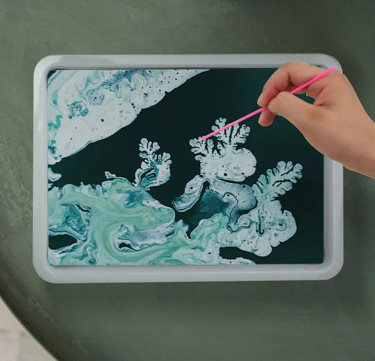 Hand painted doodle educational toys art kit with six gouache pigment pots, paper, and stirring rods.