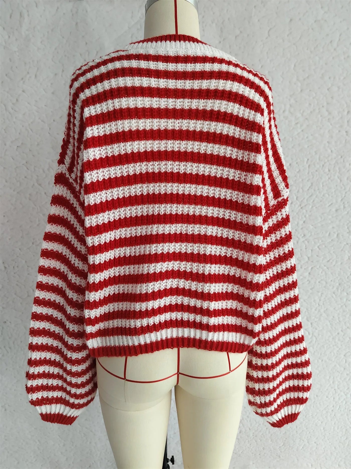 Women's vintage stripe knitted pullover sweater in a loose fit, shown in one of four available colours.