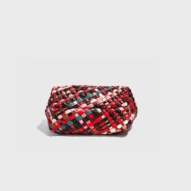 Women's casual woven PU leather shoulder bag showing handmade texture and shoulder strap.