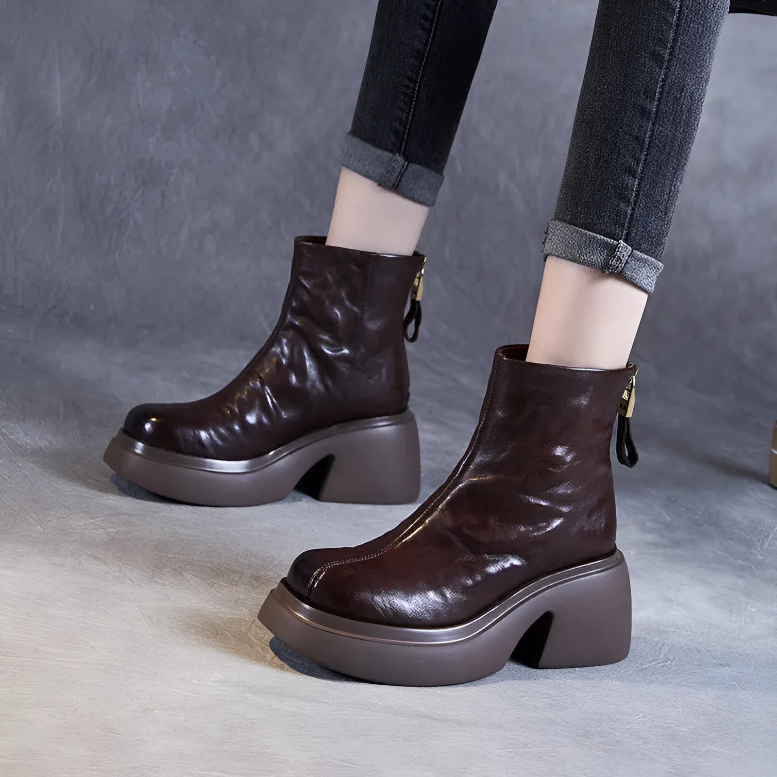 Women's chunky heel ankle boots in black with thick bottom, rubber outsole, and cotton cowhide upper