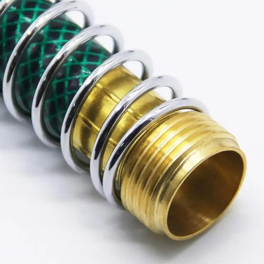 Brass garden hose connector with a visible metal spiral spring and 3/4 inch threaded connections.
