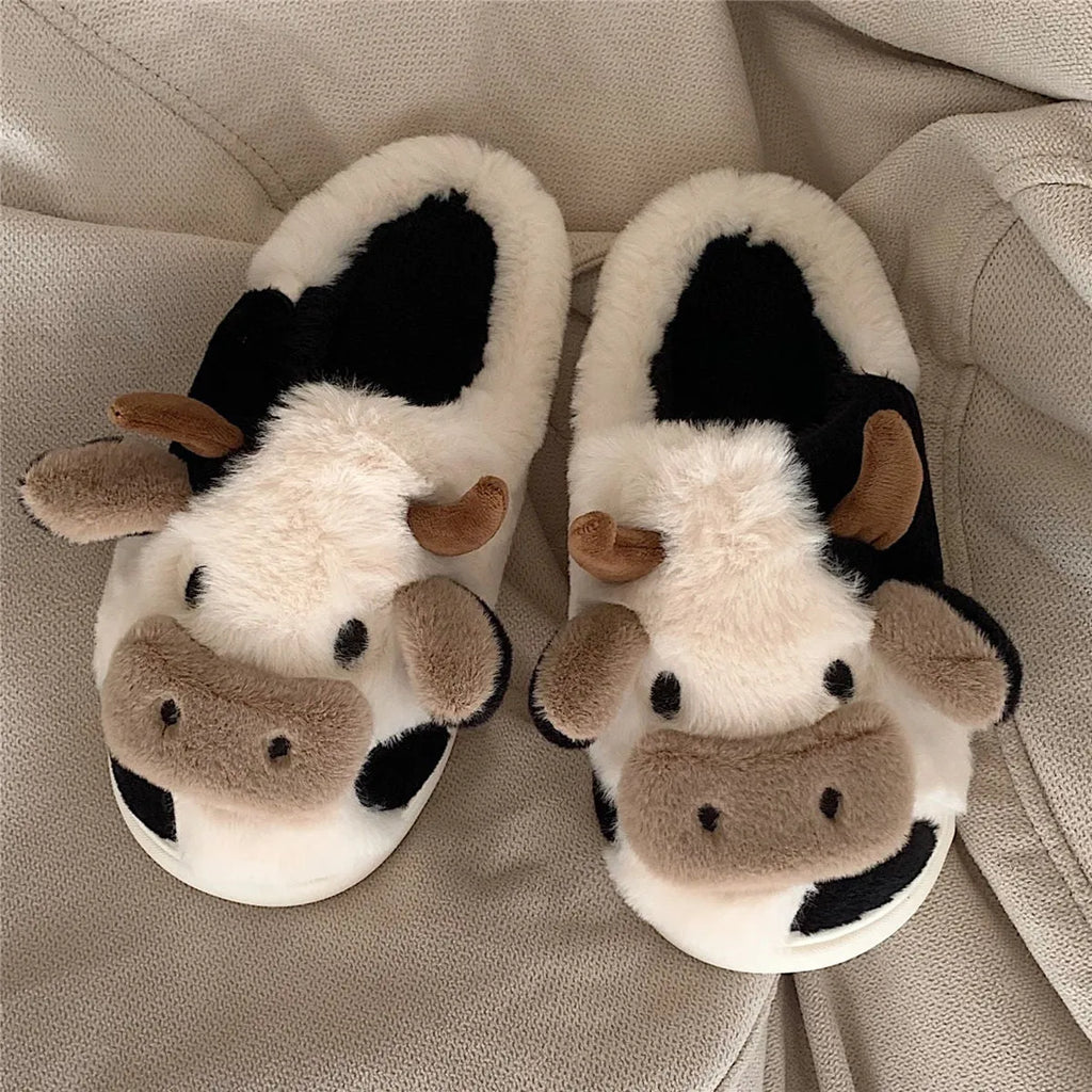 White cartoon cow slippers for women with soft faux fur and textured anti-slip soles