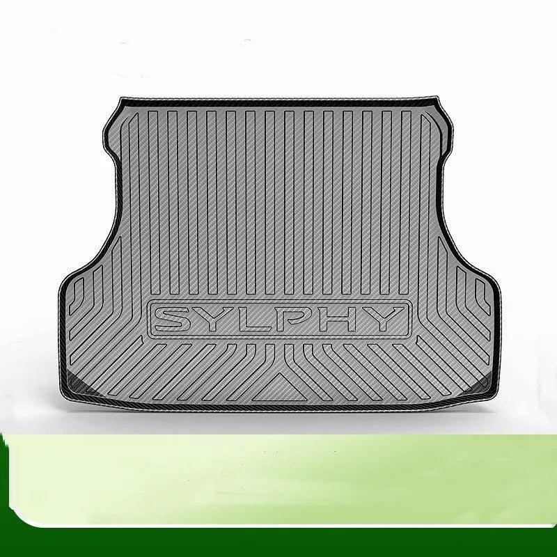 Black carbon fibre pattern TPE car boot liner mat for vehicle cargo protection.