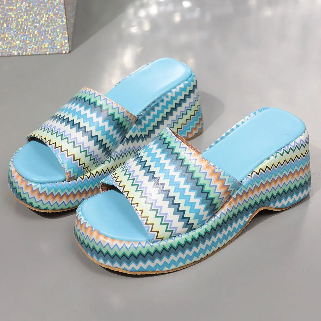Women's colourful wave print wedge sandals with a thick rubber sole and fish mouth toe.