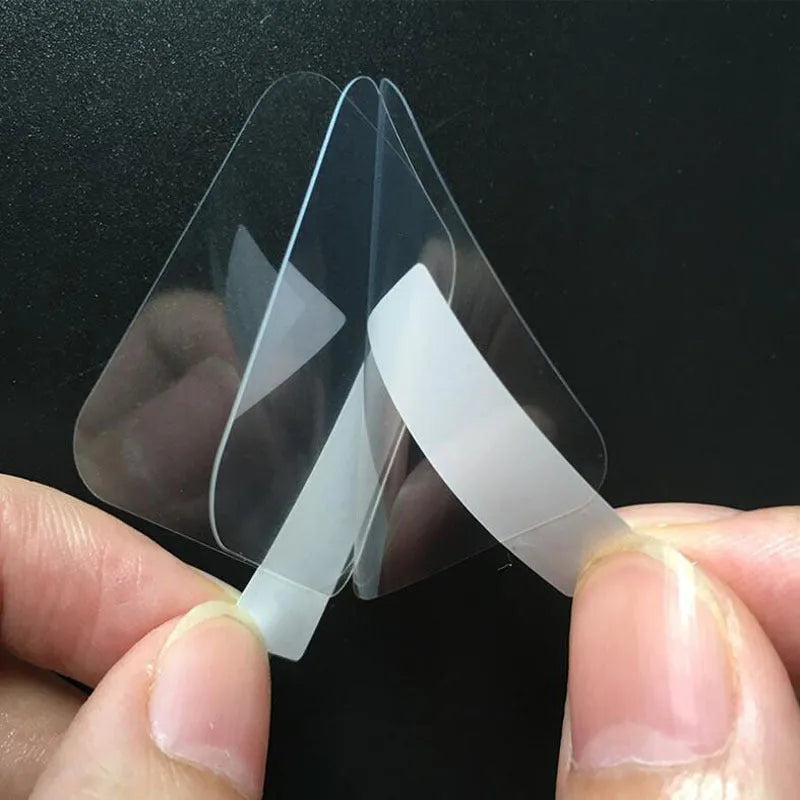 Three transparent tempered glass screen protector films for Ticwatch2 smartwatch on a white background.