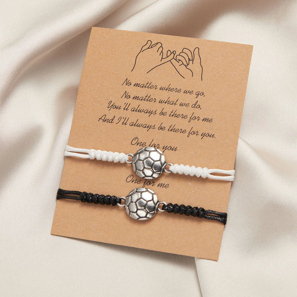 Black and white mixed color geometric bracelet with electroplated alloy finish on white background