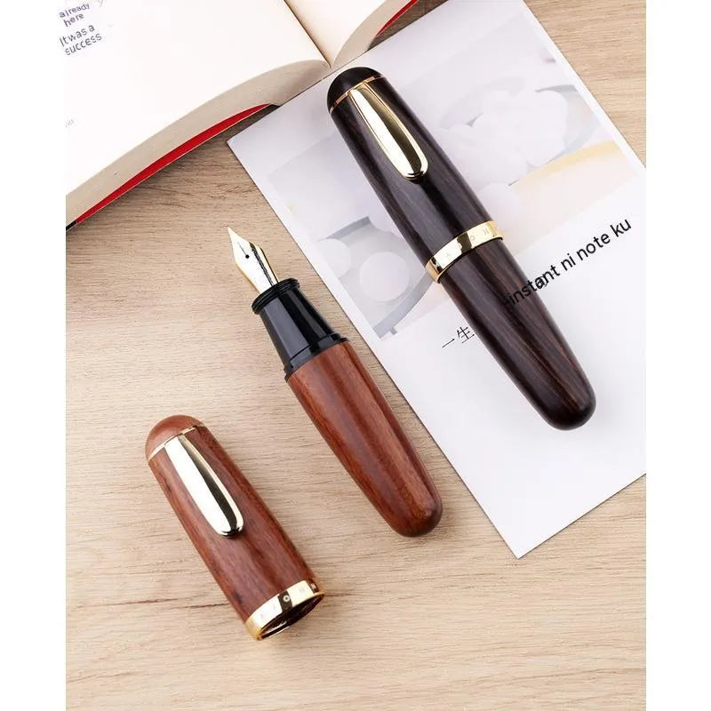Solid wood short chubby ink pen with fine tip on wooden surface