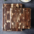 Brown acacia solid wood cutting board showing 3cm thickness edge
