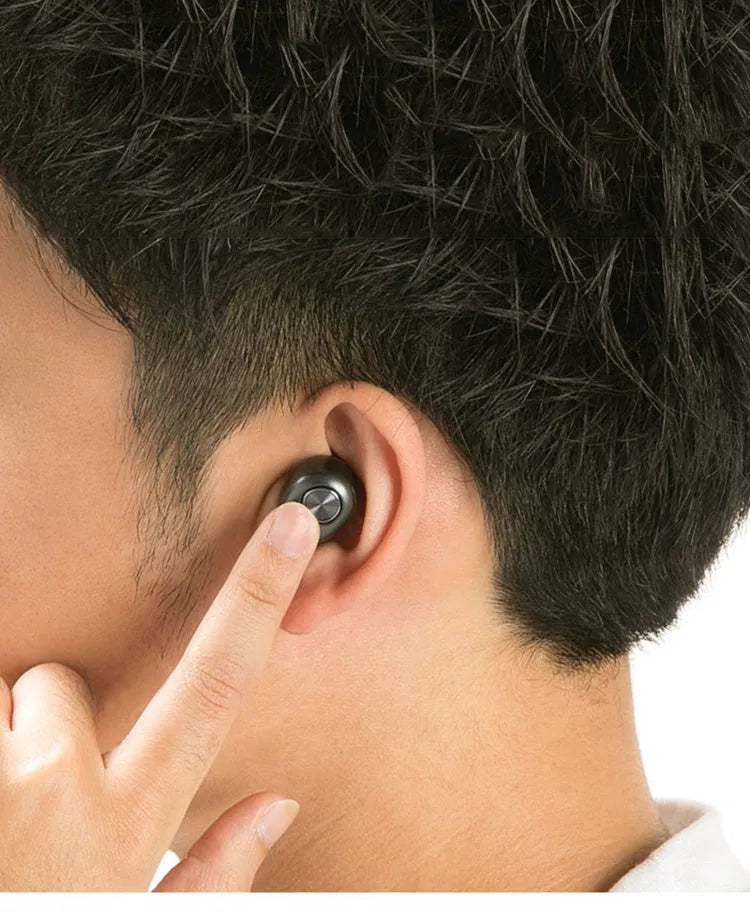 Black wireless Bluetooth headset for hands-free calling with mobile devices