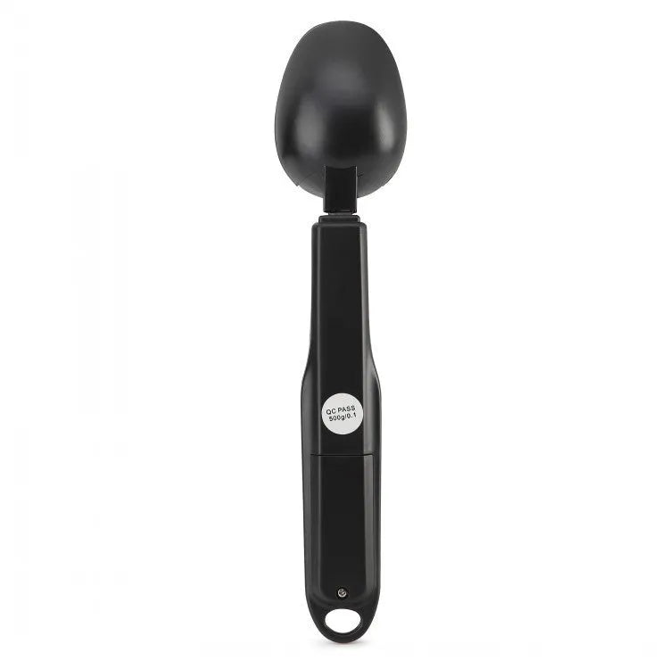 Smart digital measuring spoon with integrated display showing weight, next to AAA batteries.