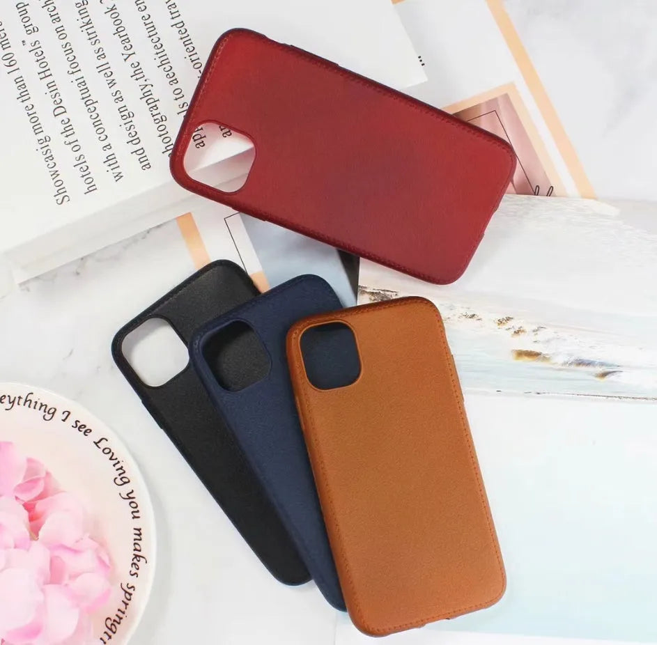 Leather TPU iPhone case shown in Black, Brown, Navy Blue, and Wine Red colours.