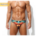 Men's quick-drying digital print shorts in briefs style on a white background.
