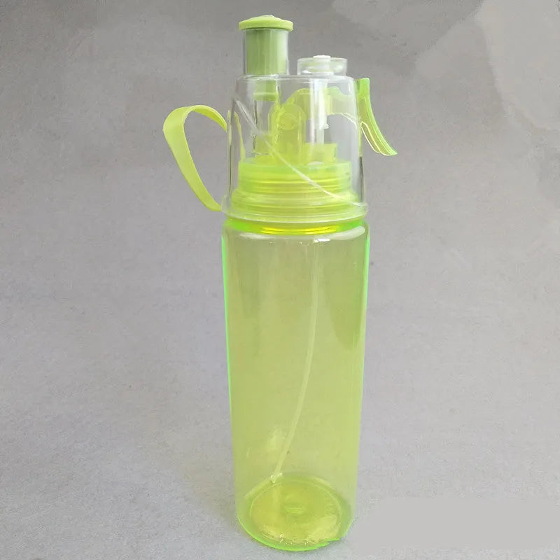 600ml spray water bottle in pink with mist function for cycling and training use