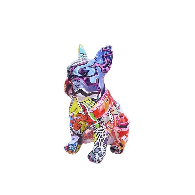 Graffiti coloured solid resin French Bulldog statue on a white background.