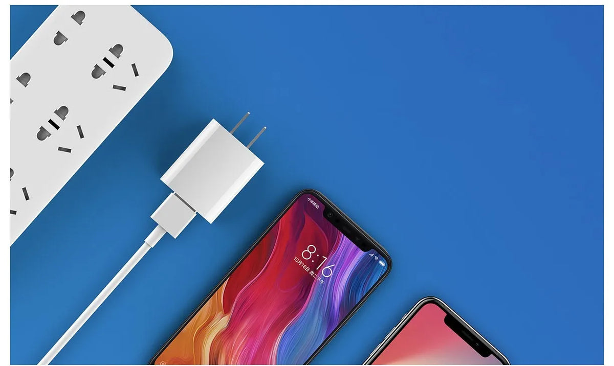 White Mi USB Fast Charger model MDY-08-EH with three-step output on plain background