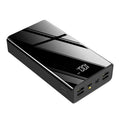 Large black or red 40000mAh power bank showing LCD display with plastic case.