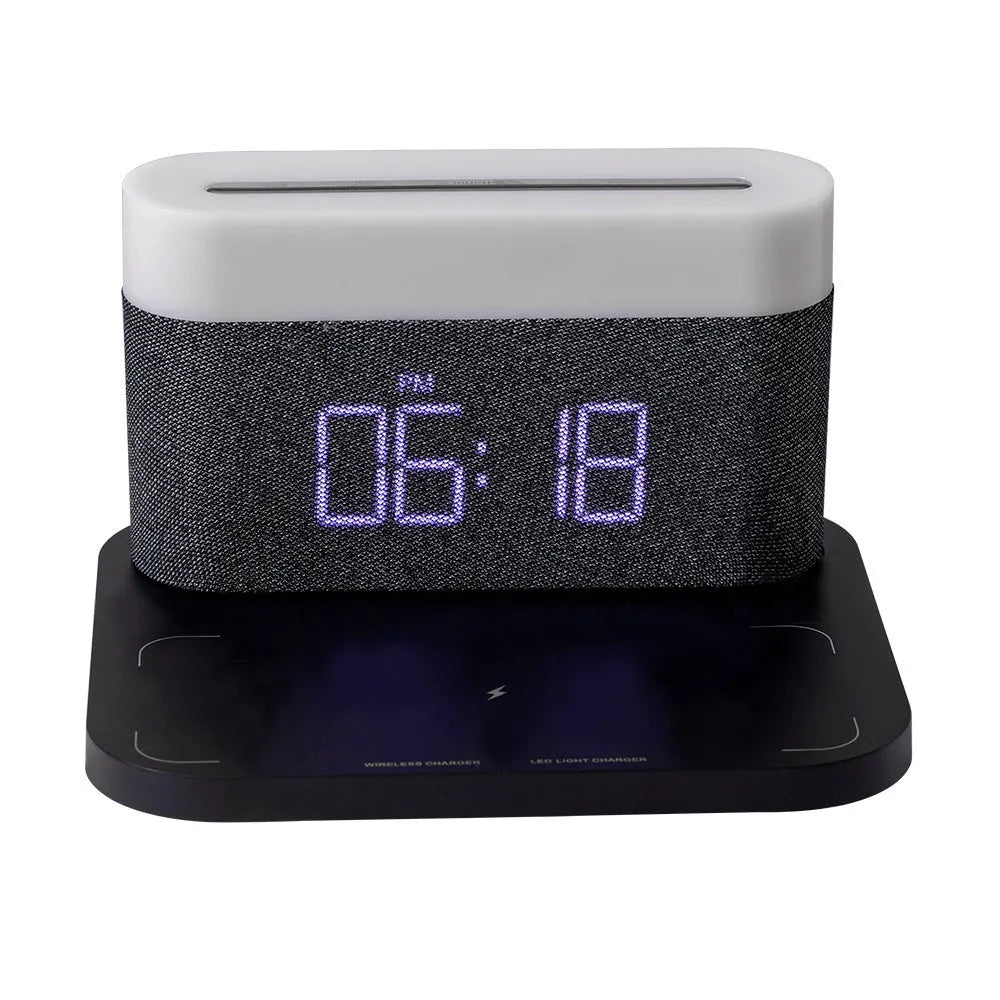 Black or white table lamp with wireless phone charging pad and digital clock display