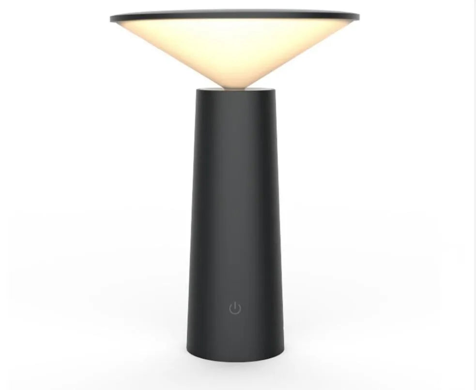 Black USB rechargeable desk lamp with touch sensor, tilted head, and 36 LED light source on a wooden table.
