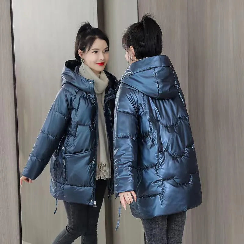 A women's loose-fit hooded winter jacket in a polyester blend, available in black, blue, green, and champagne.