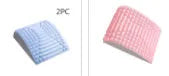Blue EVA foam back stretcher pillow for lumbar and neck support on a flat surface.