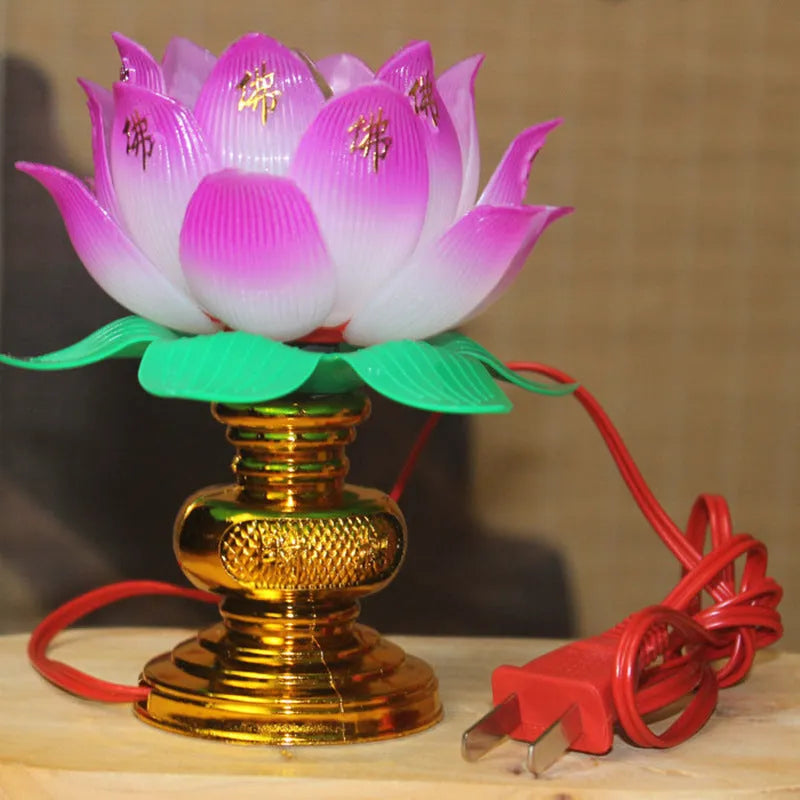 Plug-in Buddha worship lamp with colourful LED lotus flower design on a home altar.