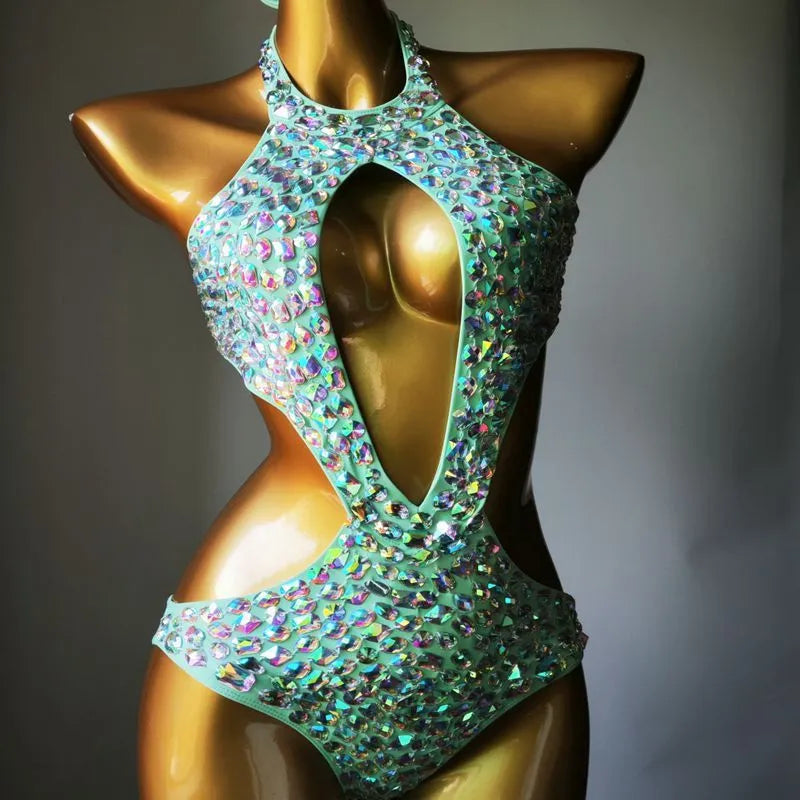 Women's one-piece swimsuit with mesh diamond pattern in nylon, available in four colours.