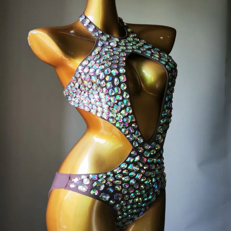 Women's one-piece swimsuit with mesh diamond pattern in nylon, available in four colours.