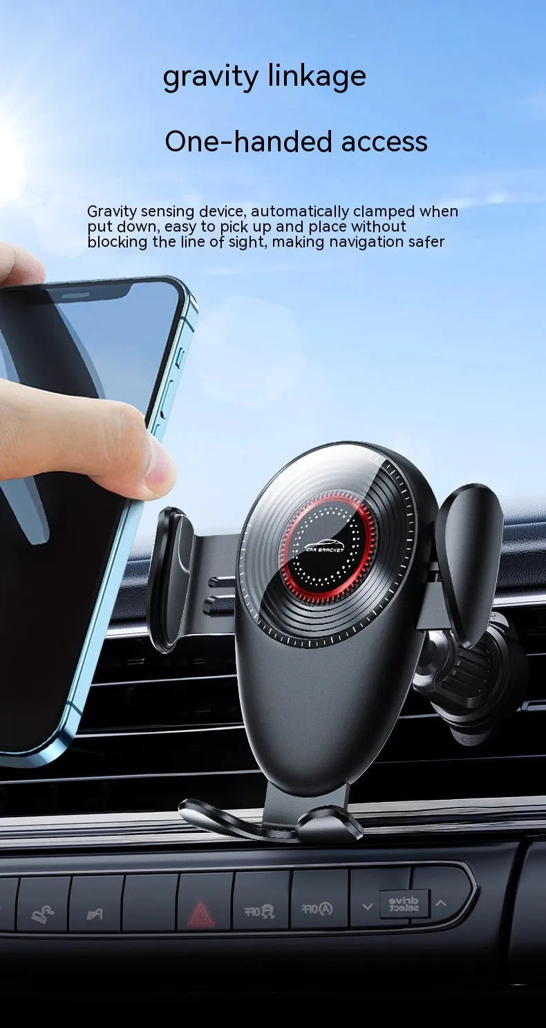 Black universal car phone bracket clipped to car air vent holding smartphone