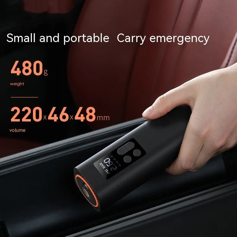Black digital car tyre inflator with LCD display showing 18cm length scale