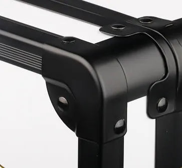 Black hard-shell PVC suitcase for storing hair styling tools like hairdryers and straighteners.