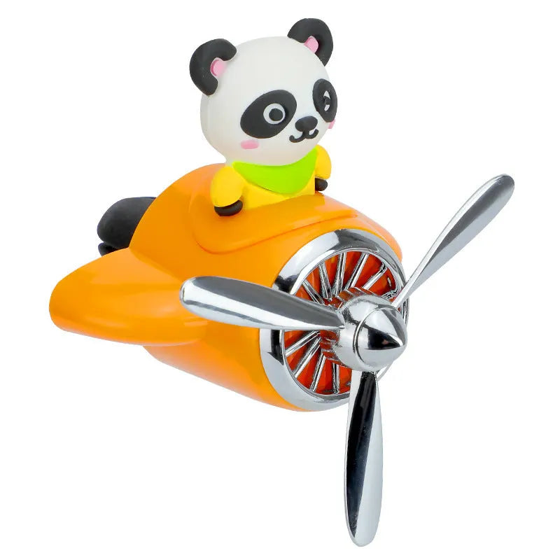 Cartoon airplane-shaped plastic car air vent clip with aromatherapy function in four colours.