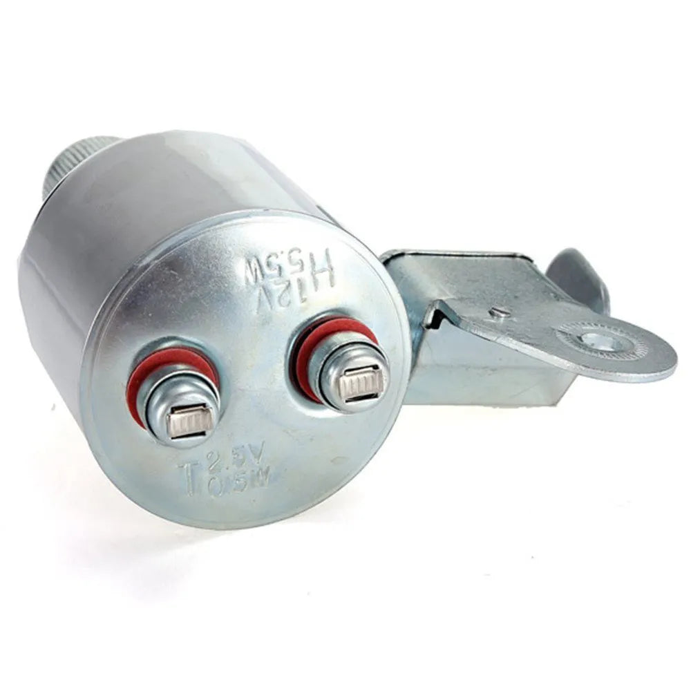 Silver bicycle dynamo generator light kit mounted on a bicycle frame with headlight and taillight.